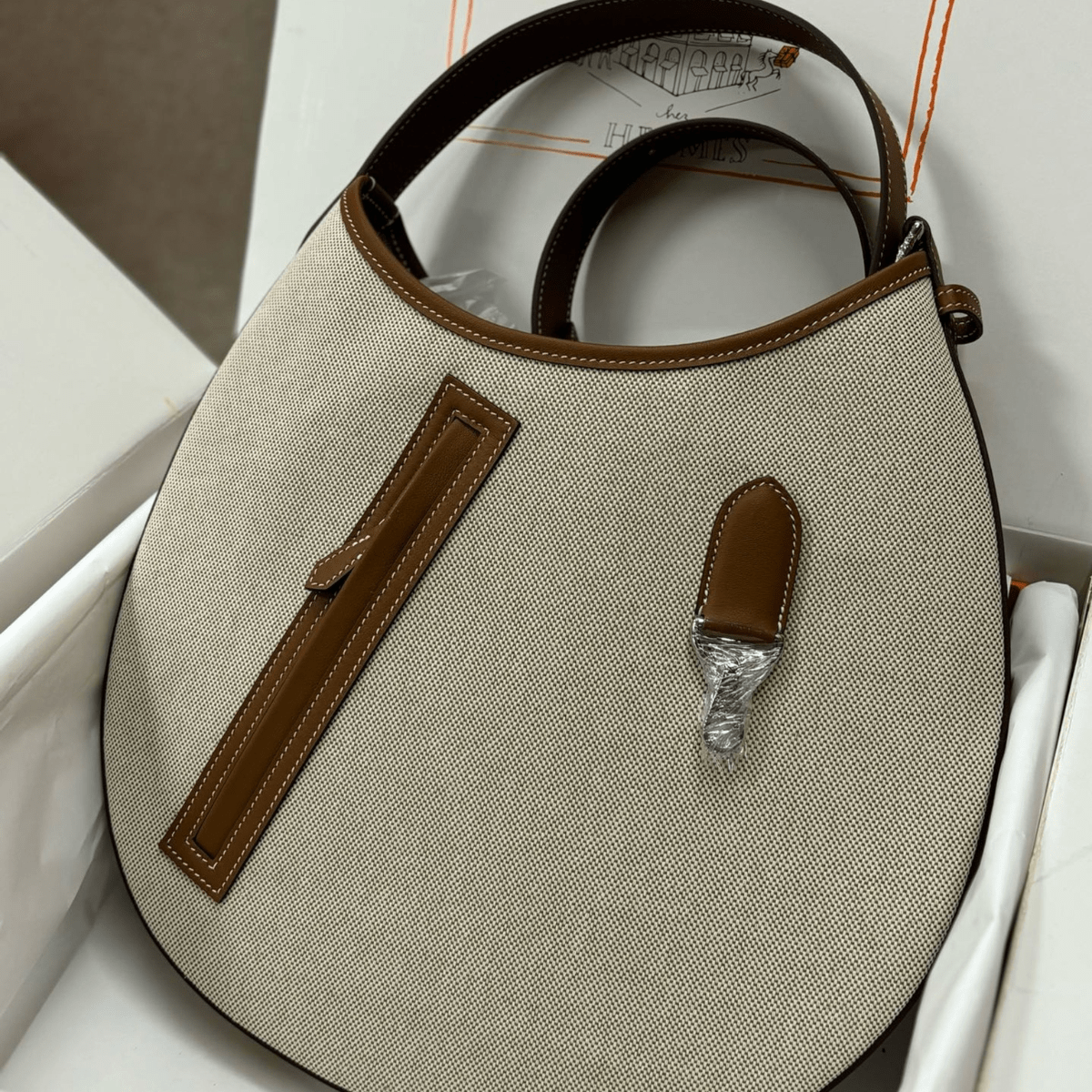 Hermès – P’tit Arçon Tasche aus Canvas & Leder